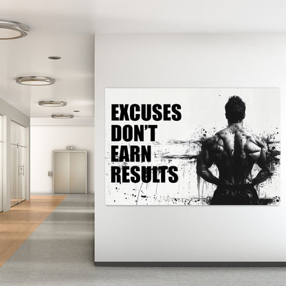 A black-and-white wall art print of a bodybuilder’s back with bold text reading "Excuses Don’t Earn Results," surrounded by ink splatter for a dramatic effect.