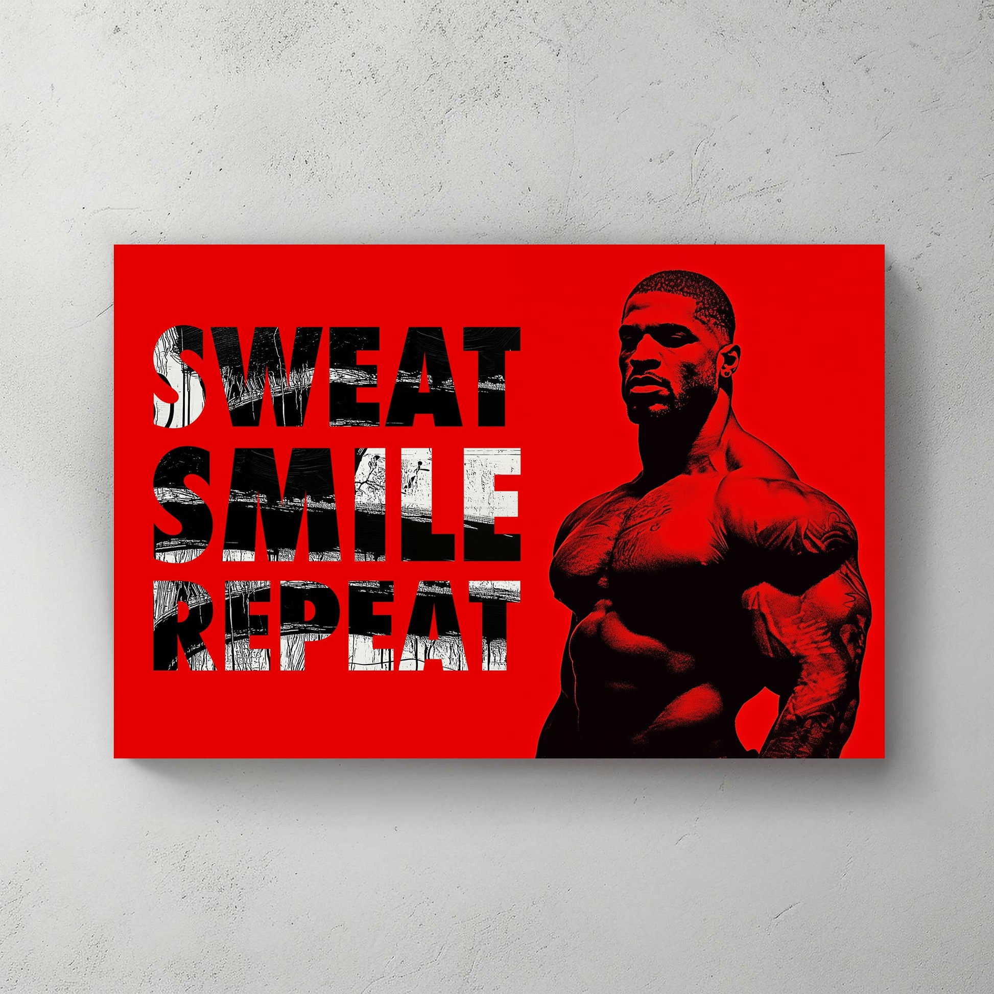 A metal print of a muscular figure on a bright red background with the text "Sweat Smile Repeat" in bold black-and-white typography.