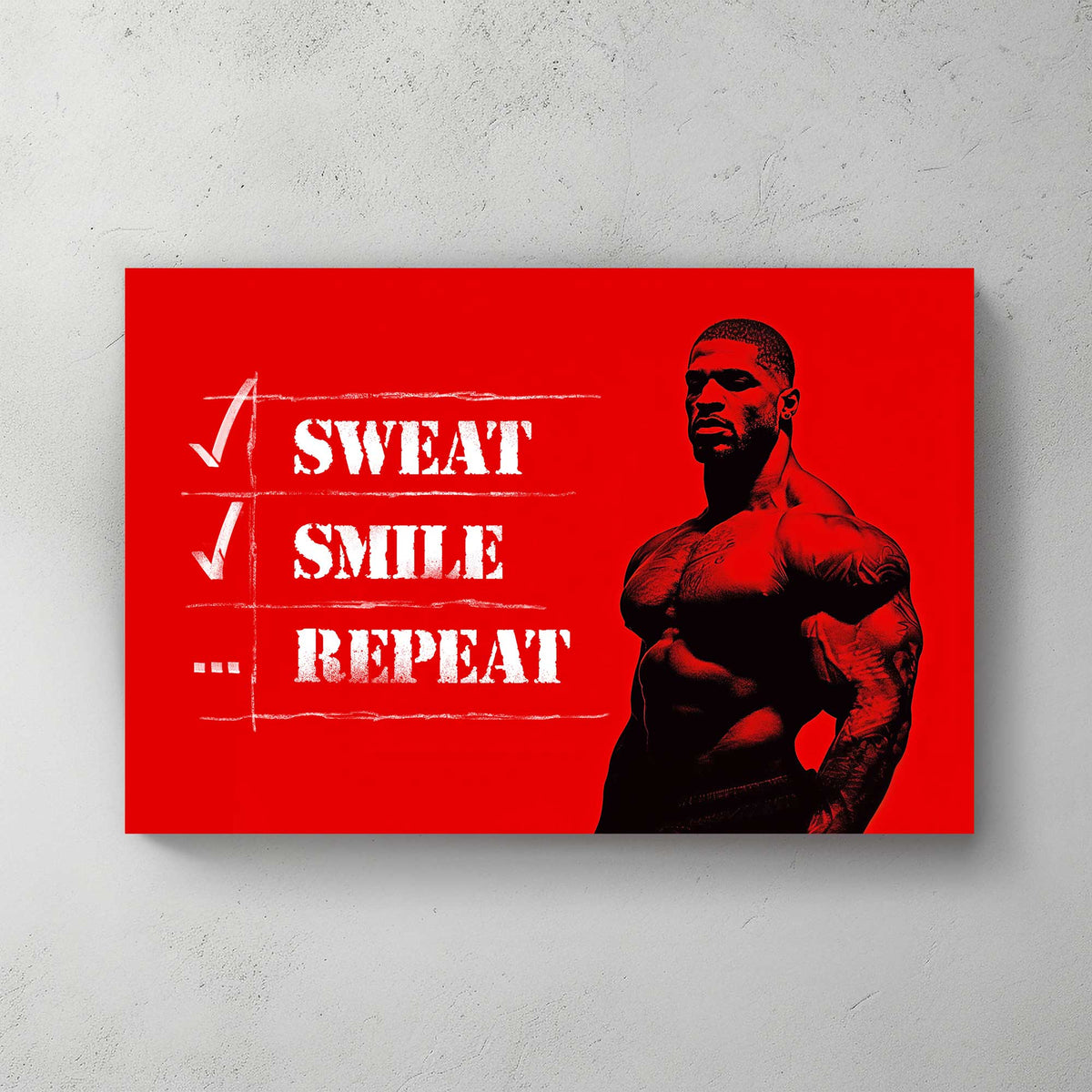A metal print of a muscular figure on a bright red background with the text "Sweat Smile Repeat" in bold black-and-white typography.