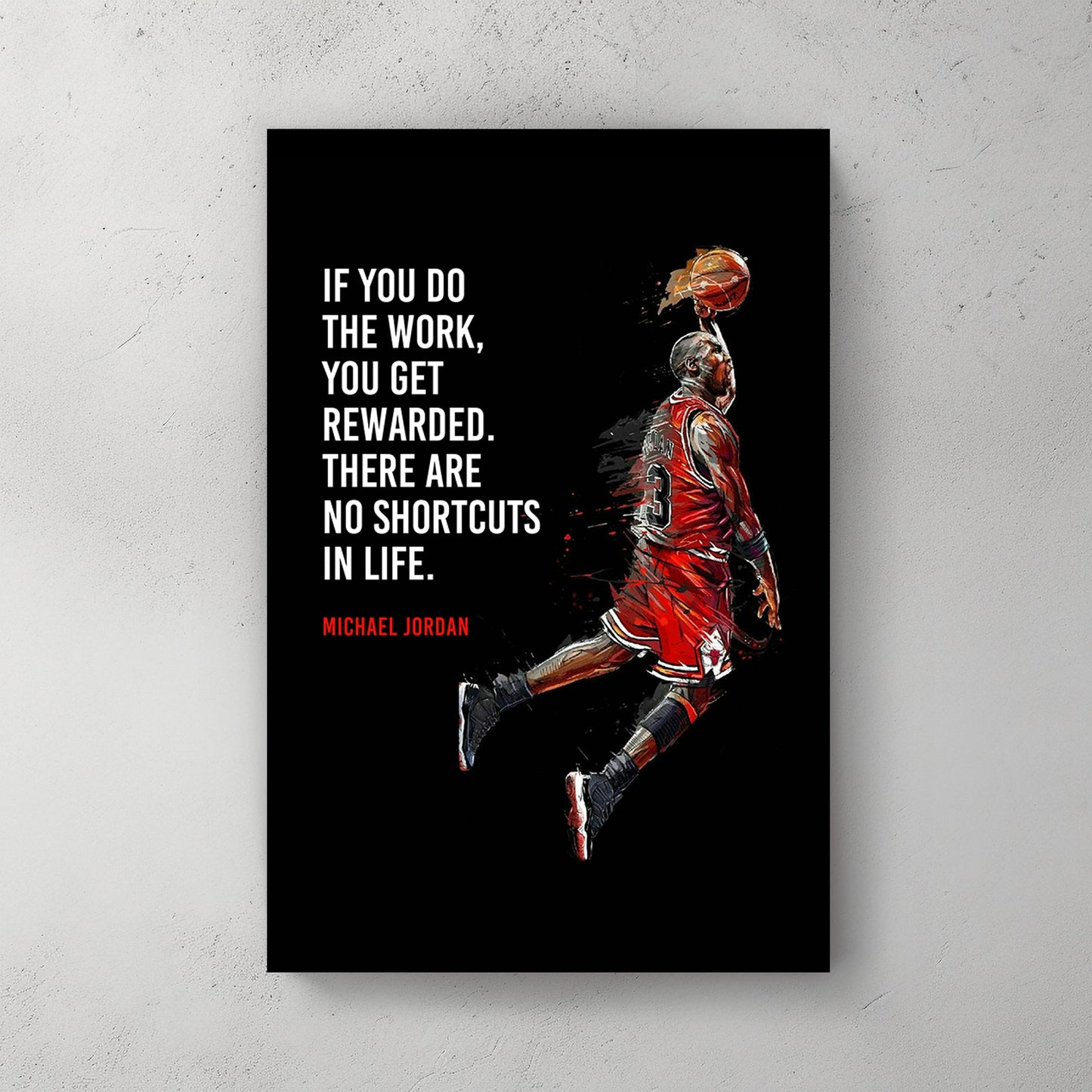 A metal wall art print of Michael Jordan mid-air in a red Chicago Bulls jersey, with the motivational quote: "If you do the work, you get rewarded. There are no shortcuts in life."