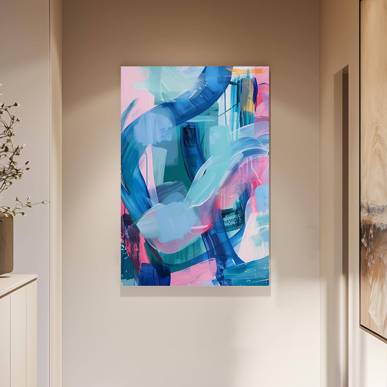 A vibrant abstract wall art print with bold swirls of aqua, pink, and cobalt blue brushstrokes on a light backdrop.