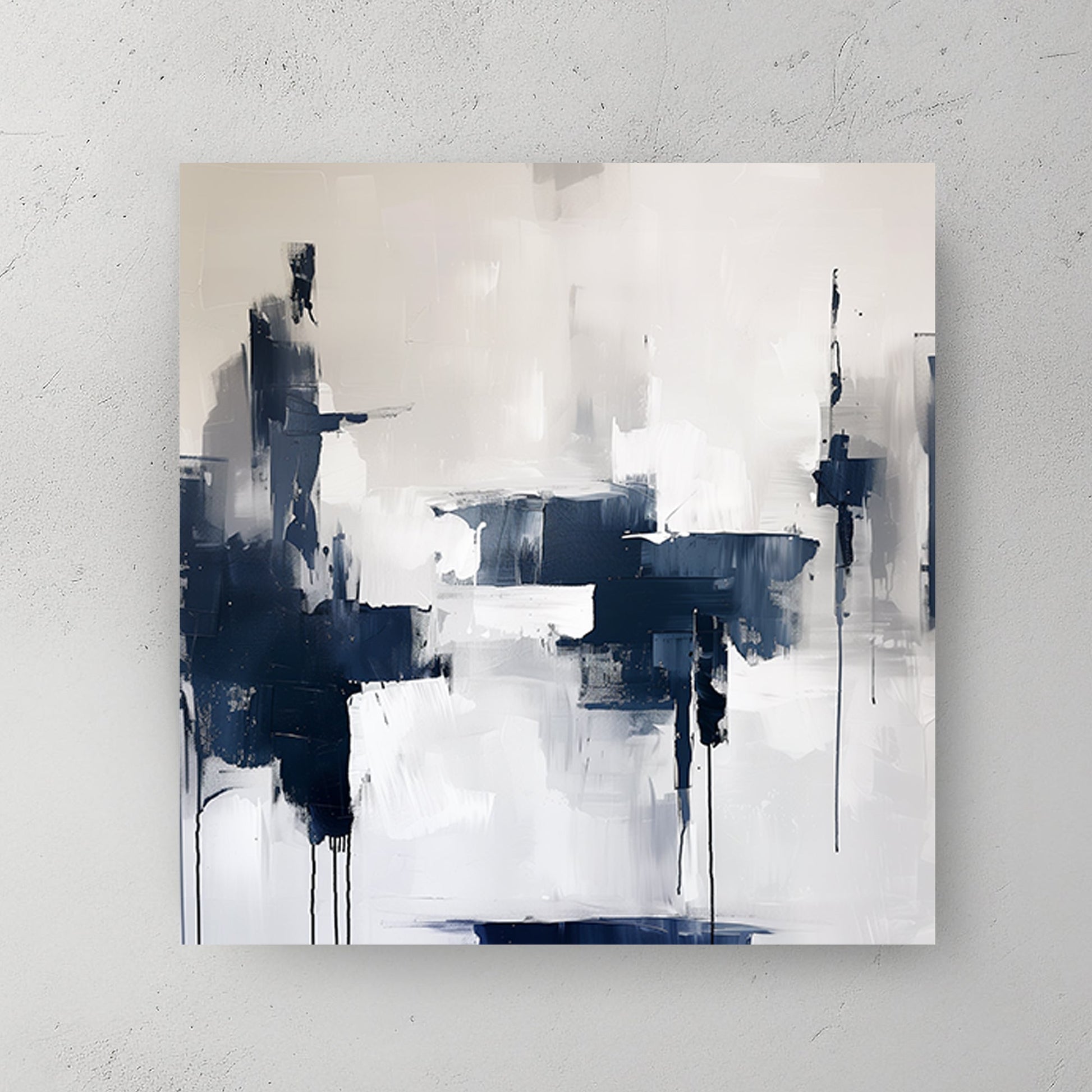 Abstract wall artwork featuring bold navy and white brushstrokes with dripped accents on a textured background.