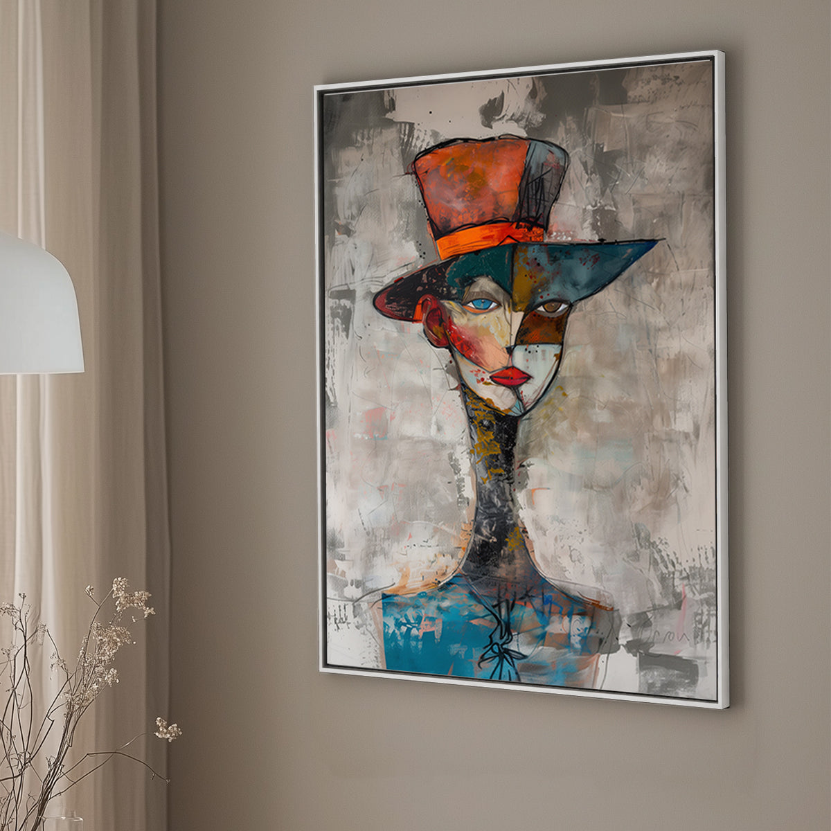 Abstract wall art portrait of a face with a divided design, featuring a vibrant hat, earthy colours, and contrasting eye expressions.