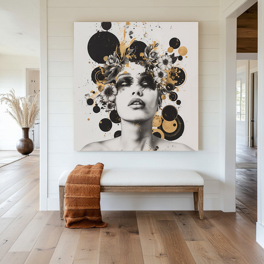Black and white wall art portrait with floral embellishments and gold accents against a white background.