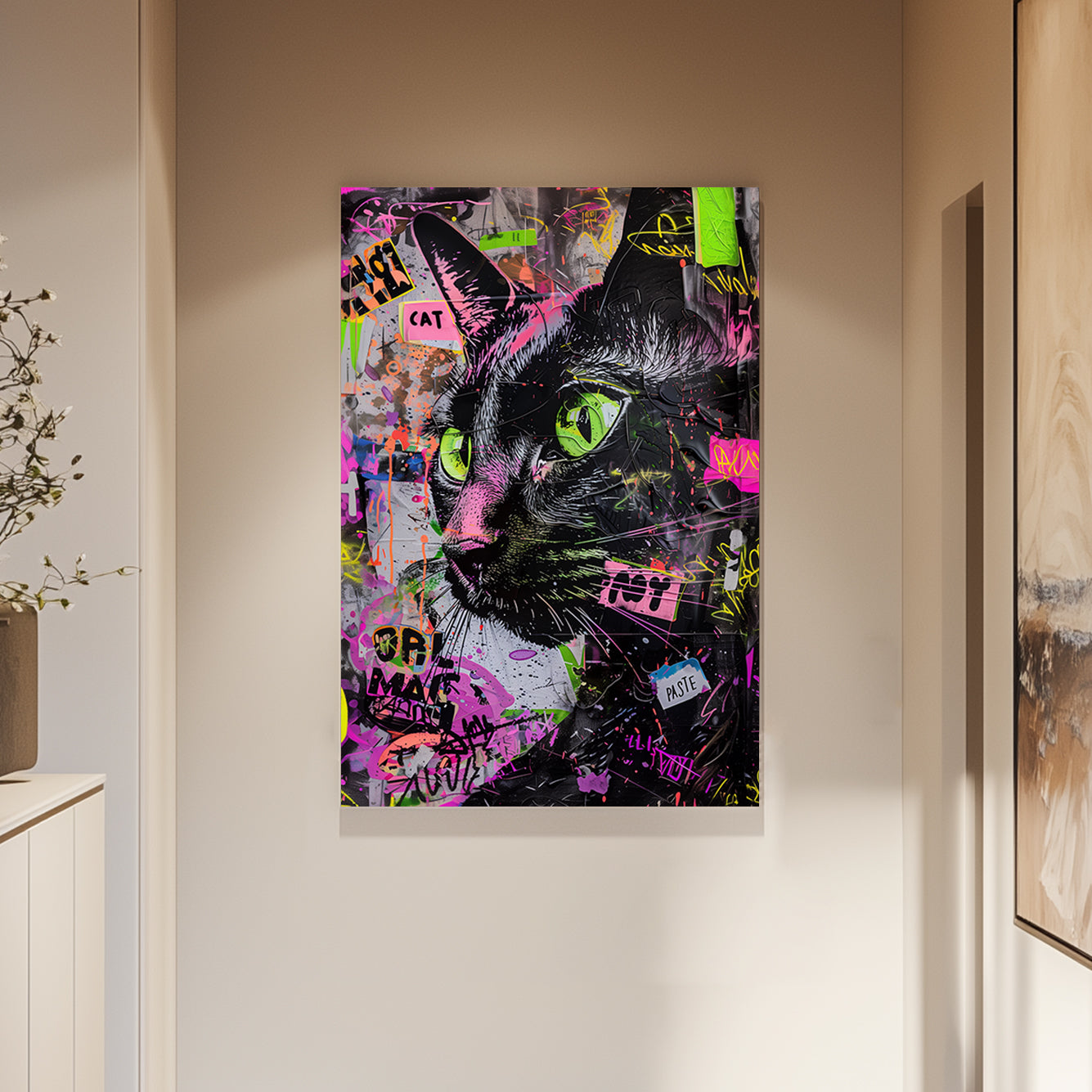 Close-up graffiti-style wall art of a black cat with neon green eyes and vibrant spray paint splashes.