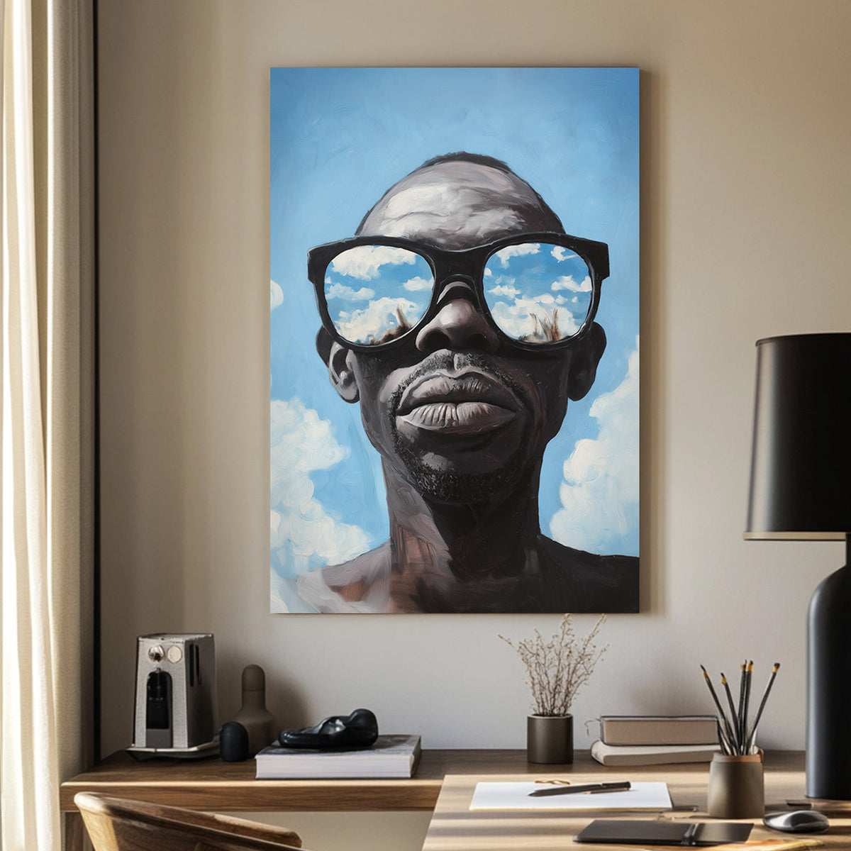 Hyper-realistic wall art print of a surrealism style of a man wearing sunglasses that reflect a vivid blue sky with clouds.