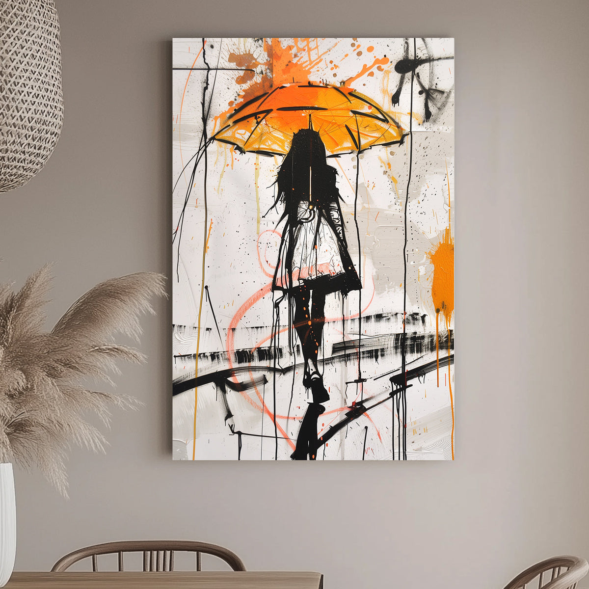 Abstract wall art print depicting a silhouette under an umbrella with vibrant orange and black splashes, symbolizing resilience and calm amidst chaos.