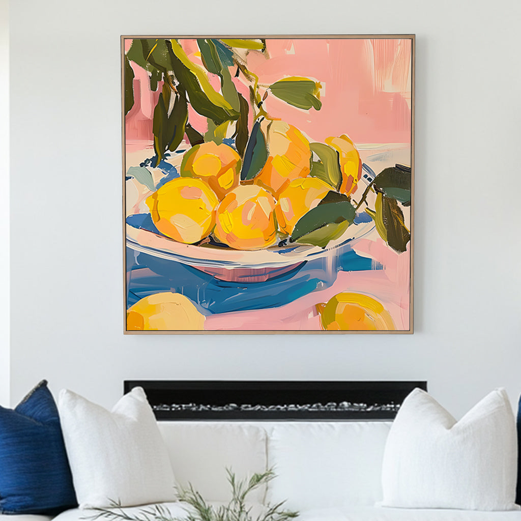 Vibrant still life wall art print of lemons on a blue and white plate, set against a pink background, ideal for adding a splash of freshness and color to home decor.