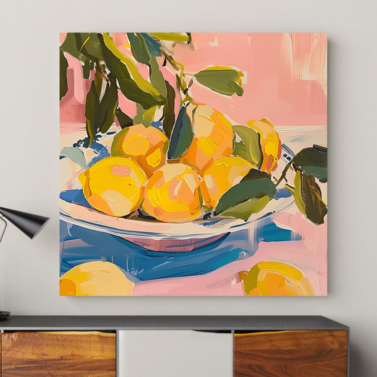 Vibrant still life wall art print of lemons on a blue and white plate, set against a pink background, ideal for adding a splash of freshness and color to home decor.