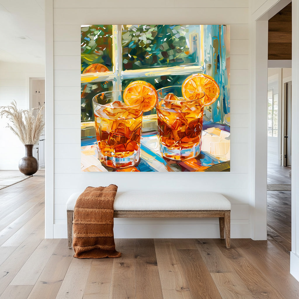wall art print of two glasses of iced tea with orange slices, set against a garden view through a window, capturing the essence of summer refreshment and relaxation.