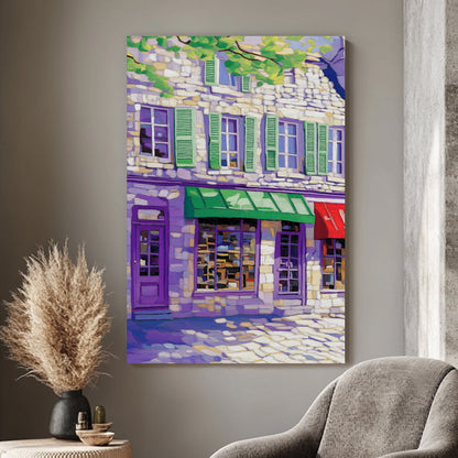 Impressionist-style wall art print of a European street scene with colorful storefronts and stone buildings, under a canopy of lush green leaves.