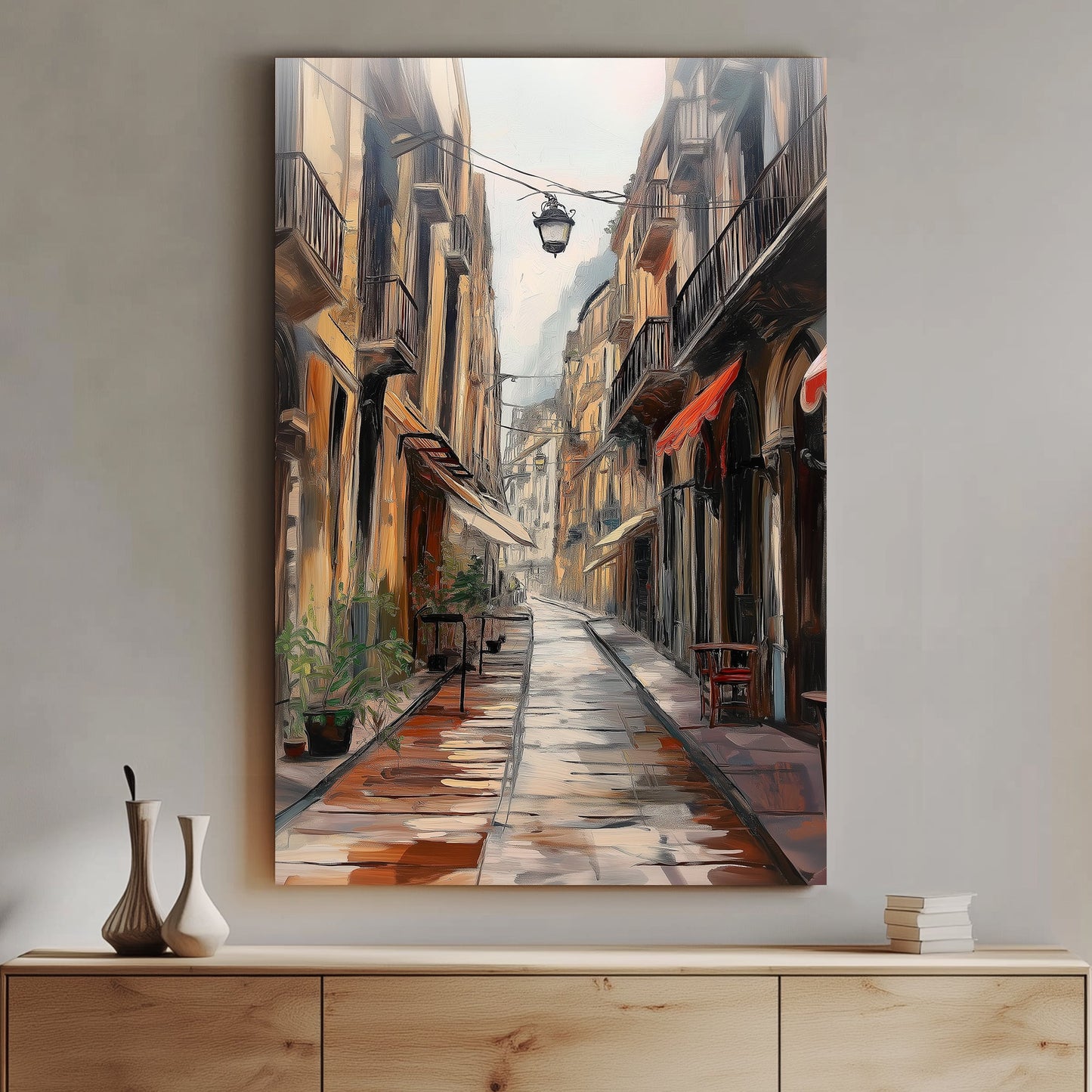 Oil wall art print of a narrow city alley with tall buildings, wet cobblestone streets reflecting light, and small balconies adorned with plants, under a hazy sky.