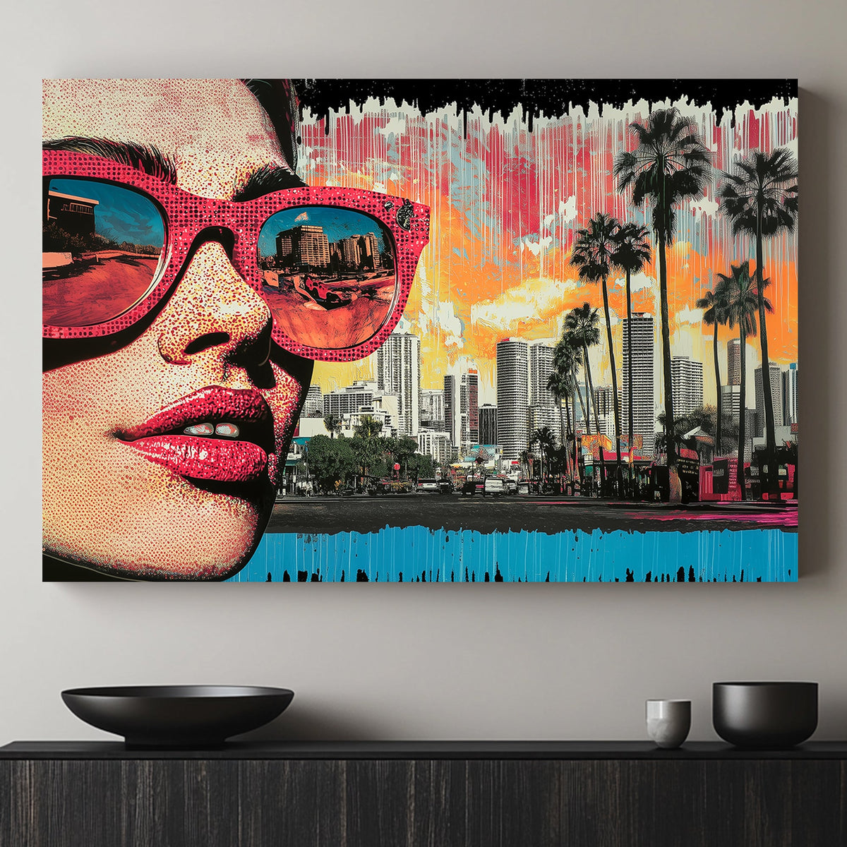 A vibrant pop art wall art print of a close-up woman’s face in dotted comic style, with sunglasses reflecting a city skyline and red car, against a neon sunset.
