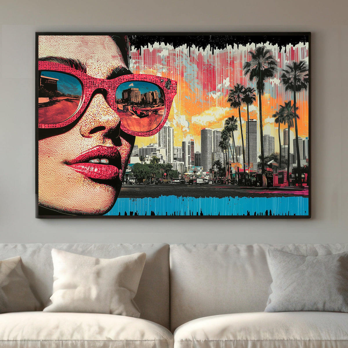 A vibrant pop art wall art print of a close-up woman’s face in dotted comic style, with sunglasses reflecting a city skyline and red car, against a neon sunset.