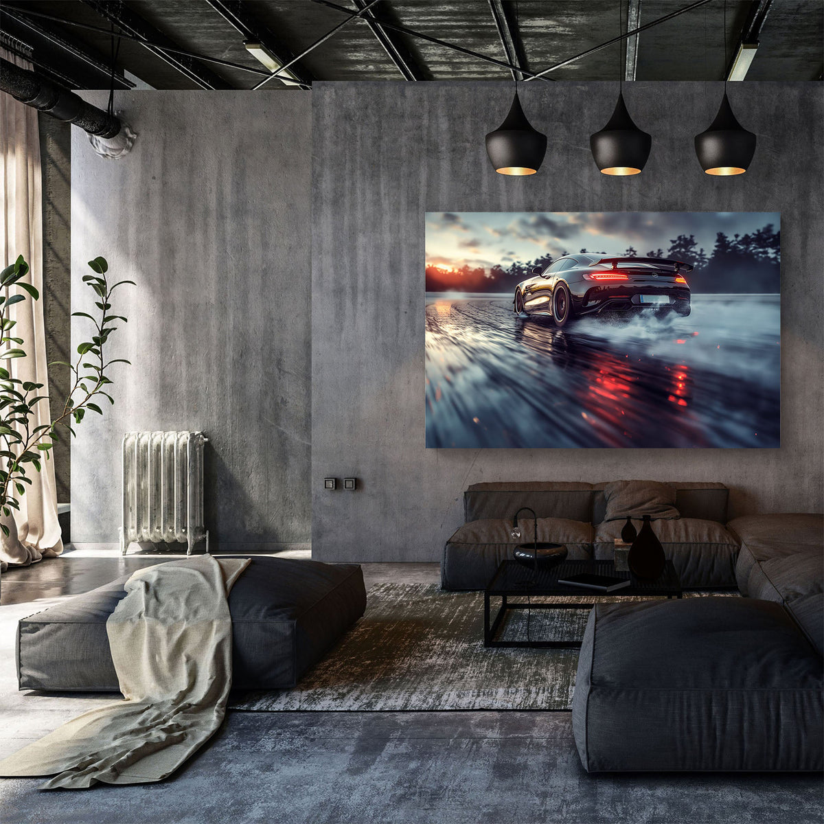 A large rectangular wall art print showing a sports car drifting on wet pavement at sunset, displayed above a gray sectional sofa in a modern industrial-style living room.