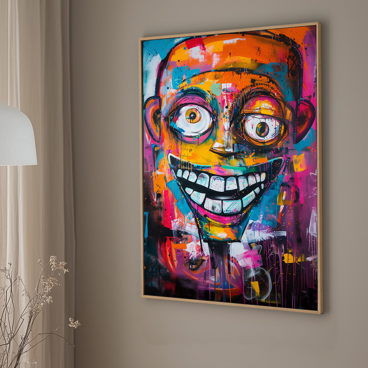 Abstract graffiti-style art of a colourful grinning face with exaggerated features and vibrant splashes of pink, blue, and orange.