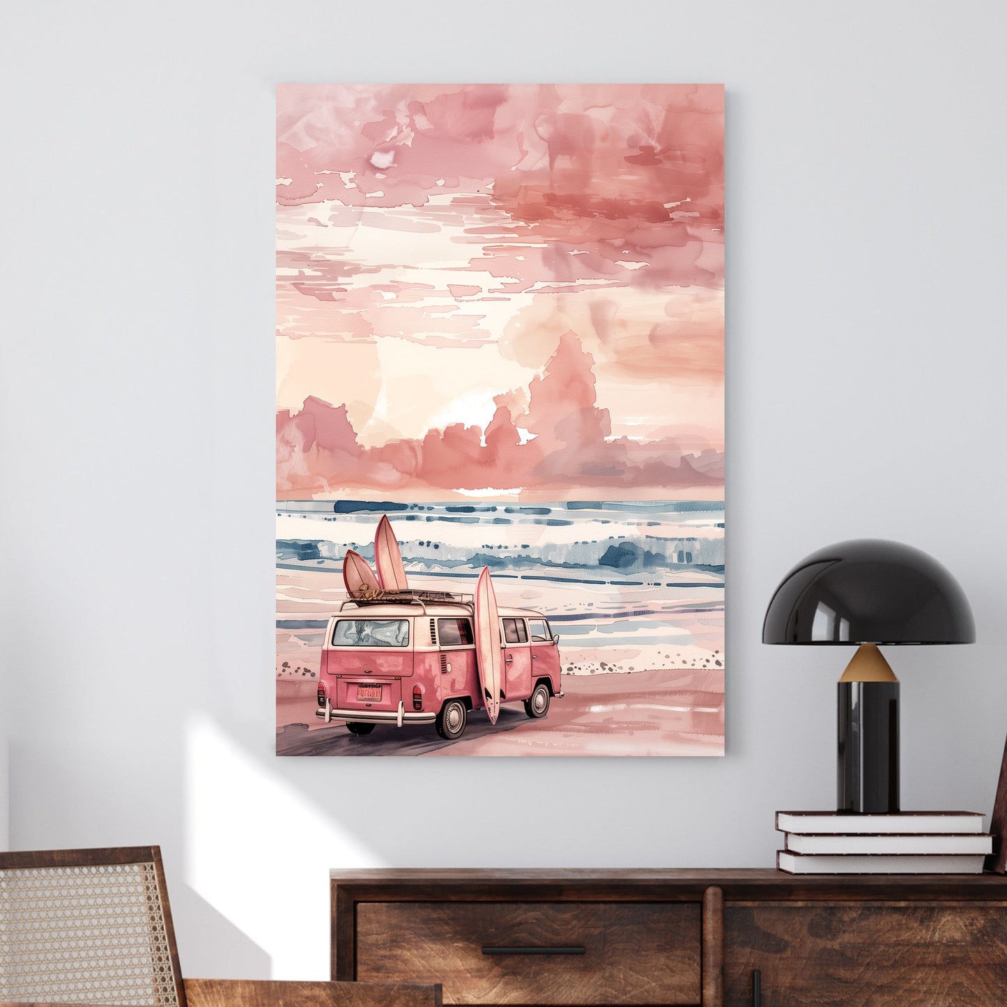 A vintage pink surf van with surfboards leaning against it, parked on a peaceful beach at sunset. Soft pastel skies and rolling waves create a dreamy, watercolour-inspired coastal scene.