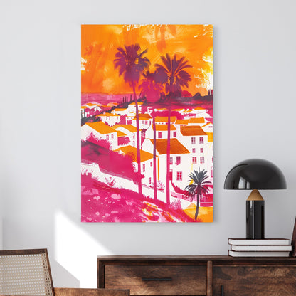 A bold and colourful digital wall art print of a Mediterranean coastal village with palm trees, vibrant orange rooftops, and a pink-hued sunset sky, blending pop art and expressionism.