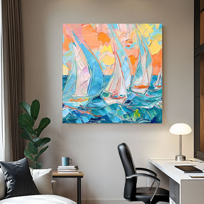 A textured impressionist-style wall art print of sailboats navigating vibrant blue waters under a warm pastel-hued sunset, capturing the movement of the ocean.