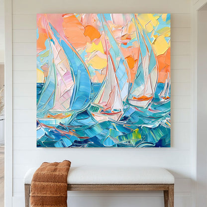 A textured impressionist-style wall art print of sailboats navigating vibrant blue waters under a warm pastel-hued sunset, capturing the movement of the ocean.