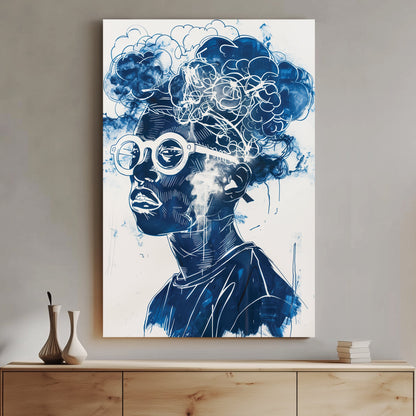 A contemporary graffiti-style wall art print of a person wearing round glasses, with abstract cloud formations seamlessly merging into their hair, rendered in deep blue and white tones.