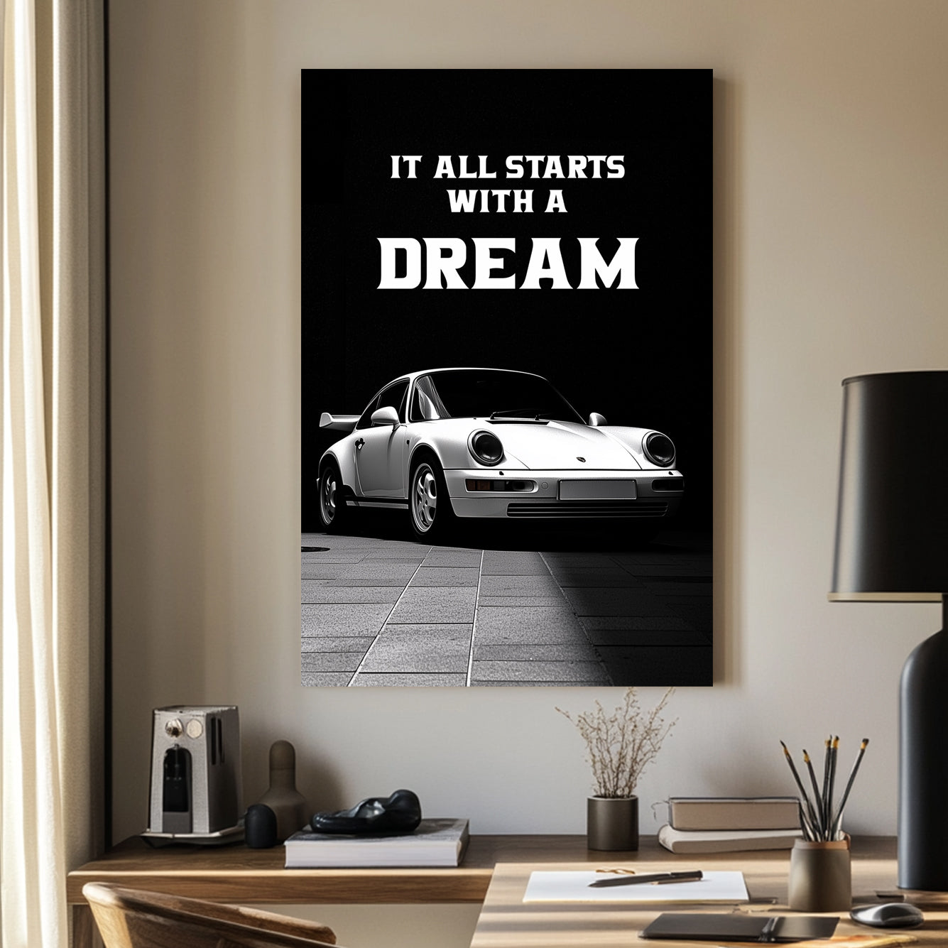 A striking black-and-white digital wall art print featuring a classic white sports car under dramatic lighting, accompanied by the bold motivational quote, “It all starts with a DREAM.”