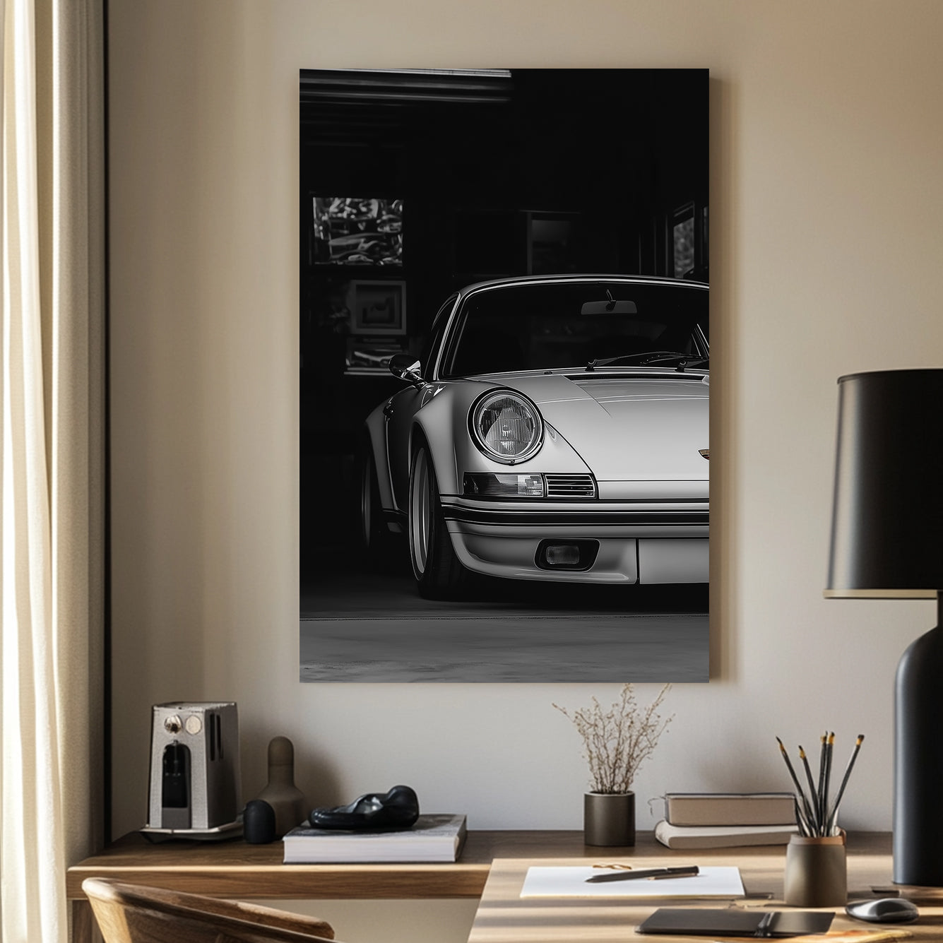 A black-and-white digital wall art print of a silver Porsche emerging from the shadows of a dimly lit garage, showcasing its refined curves and elegance.