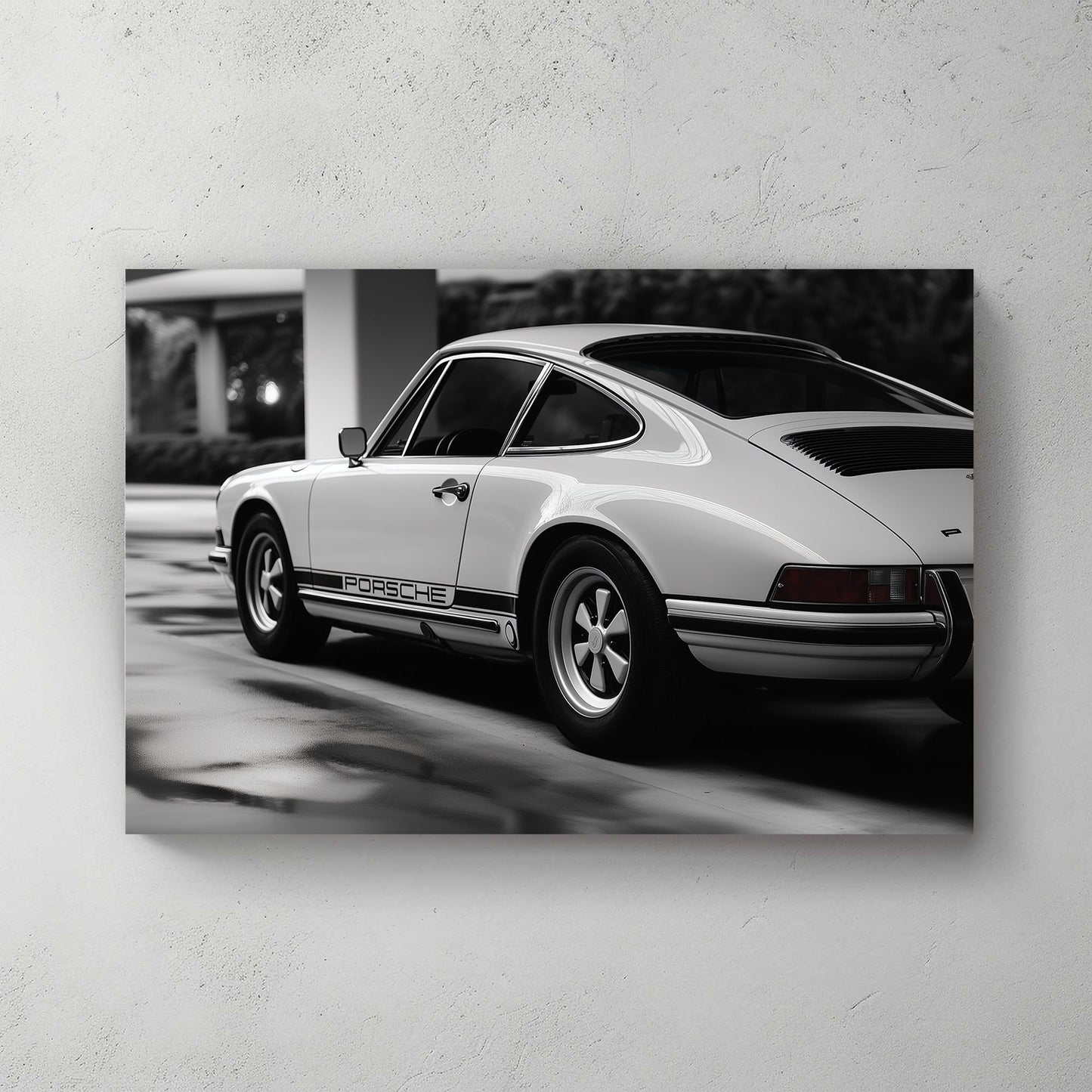 A sleek black-and-white digital wall art print of a classic Porsche, emphasizing its timeless curves and precision in a high-contrast setting.