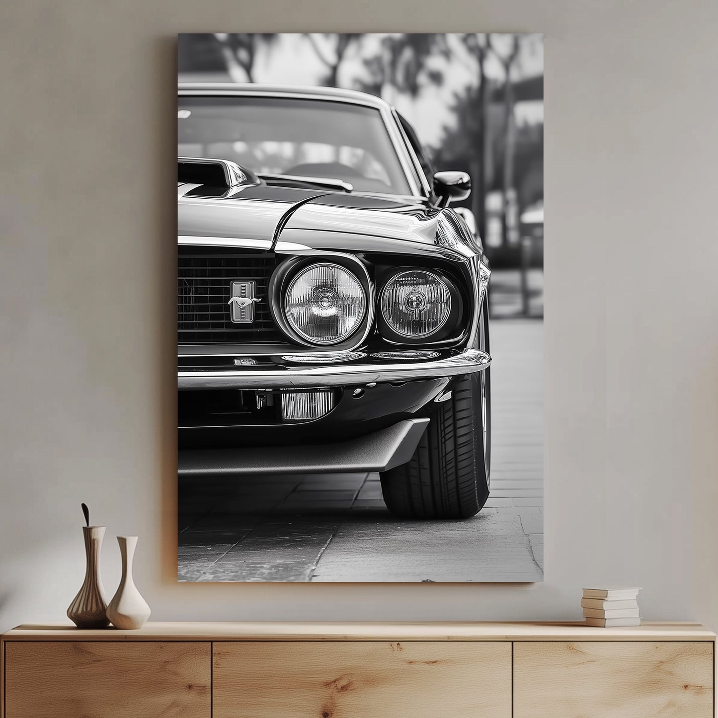 A striking black and white close-up of a classic Ford Mustang front grille and headlights, emphasizing vintage muscle car elegance and power.