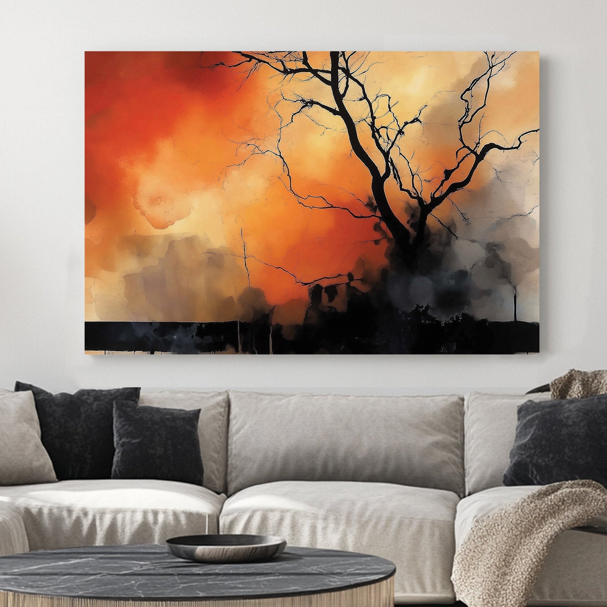 A dramatic abstract wall art print featuring a lone black tree silhouette against a fiery orange and smoky black background, evoking themes of resilience and transformation