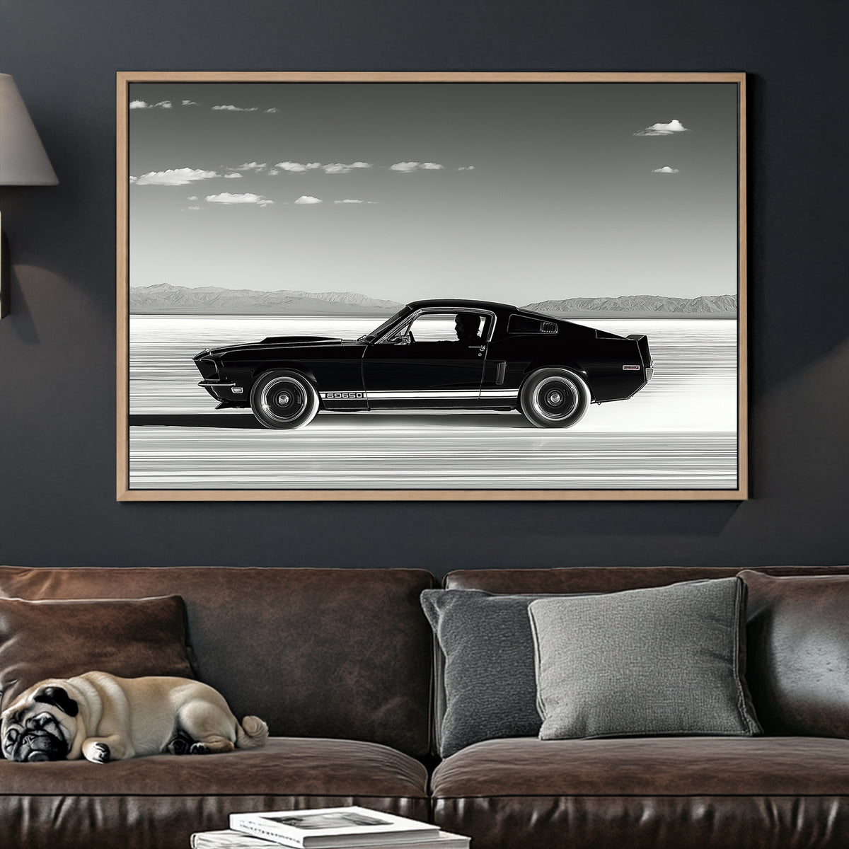 A black-and-white wall art print of a classic Ford Mustang speeding across the salt flats, with a vast open sky and distant mountains in the background.
