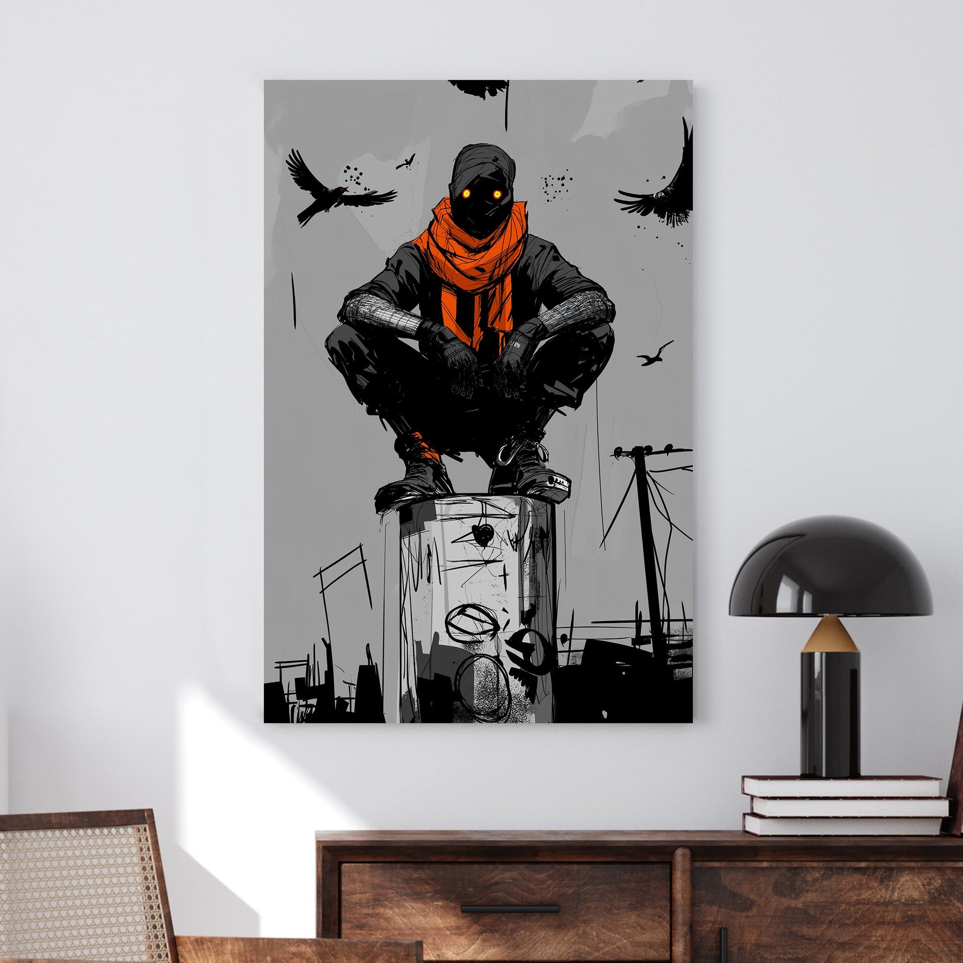 A powerful black and white wall art print featuring a mysterious hooded figure with glowing eyes perched above an urban landscape, surrounded by crows.