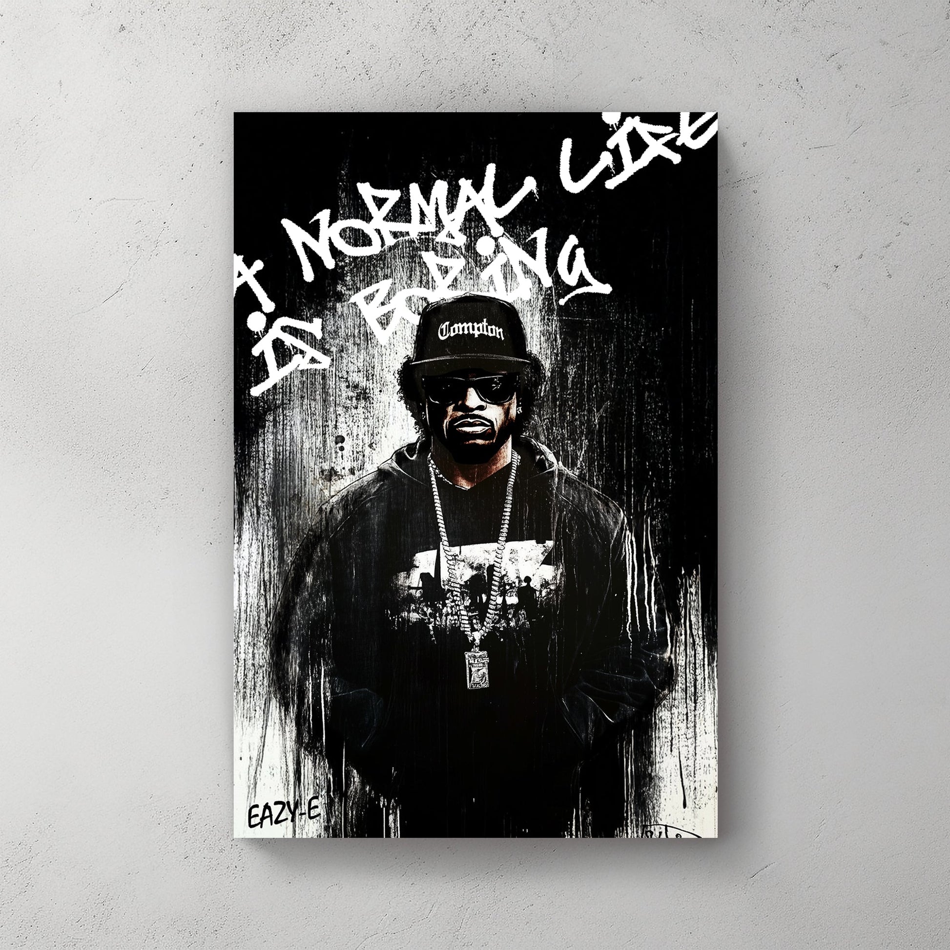 A bold black-and-white graffiti-style wall art print of a hip-hop legend Eaze-E, featuring raw paint drips and rebellious street art typography.