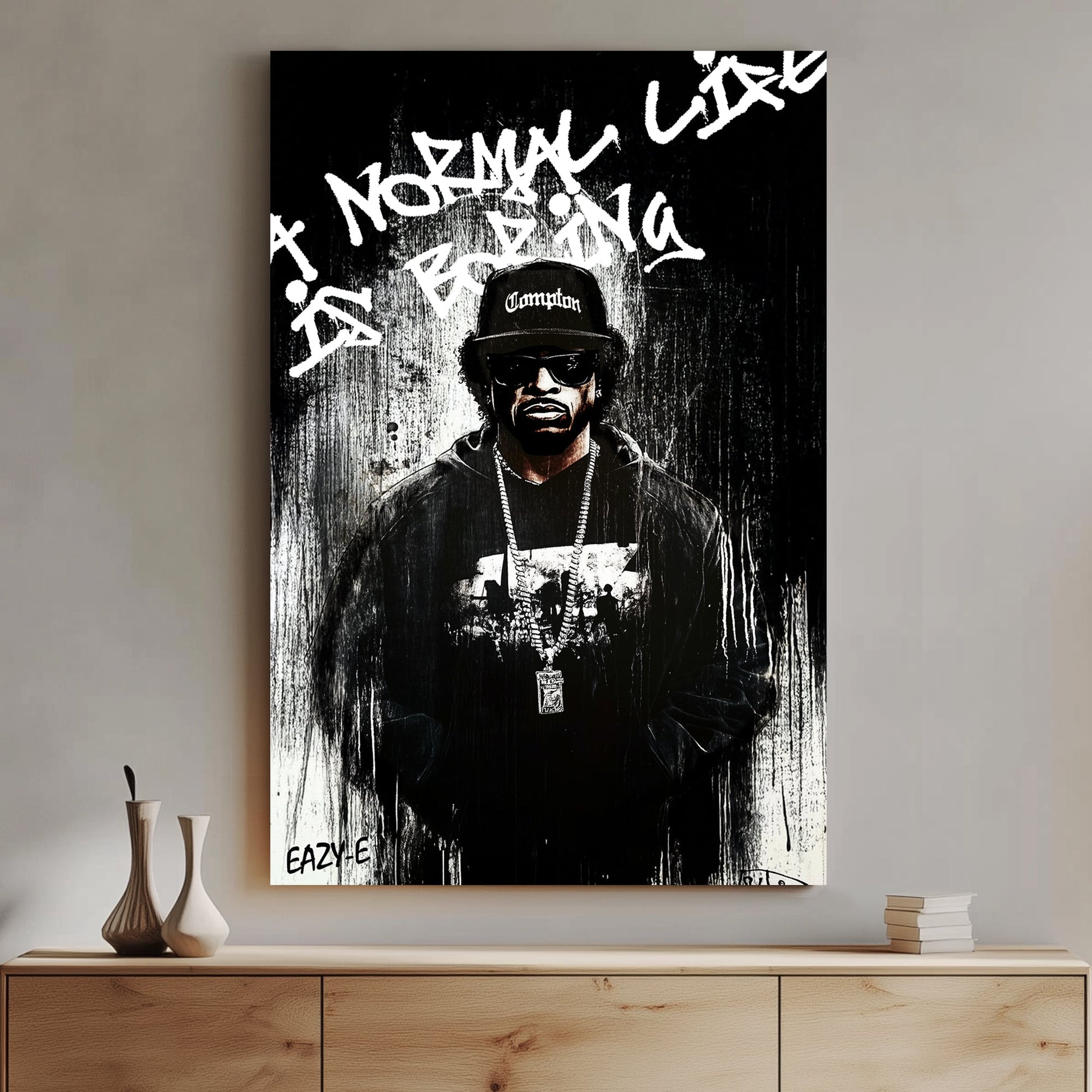 A bold black-and-white graffiti-style wall art print of a hip-hop legend Eaze-E, featuring raw paint drips and rebellious street art typography.