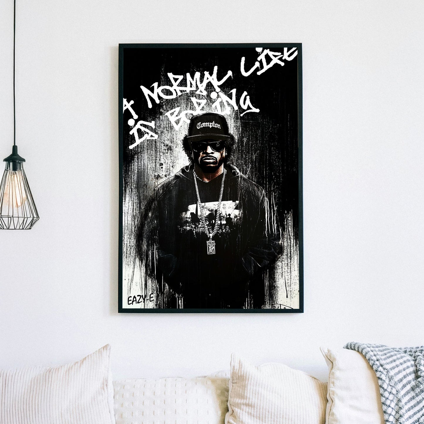 A bold black-and-white graffiti-style wall art print of a hip-hop legend Eaze-E, featuring raw paint drips and rebellious street art typography.