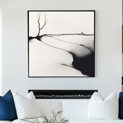 A minimalist black and white ink wall art print of a lone barren tree, set against an abstract landscape with fluid ink washes