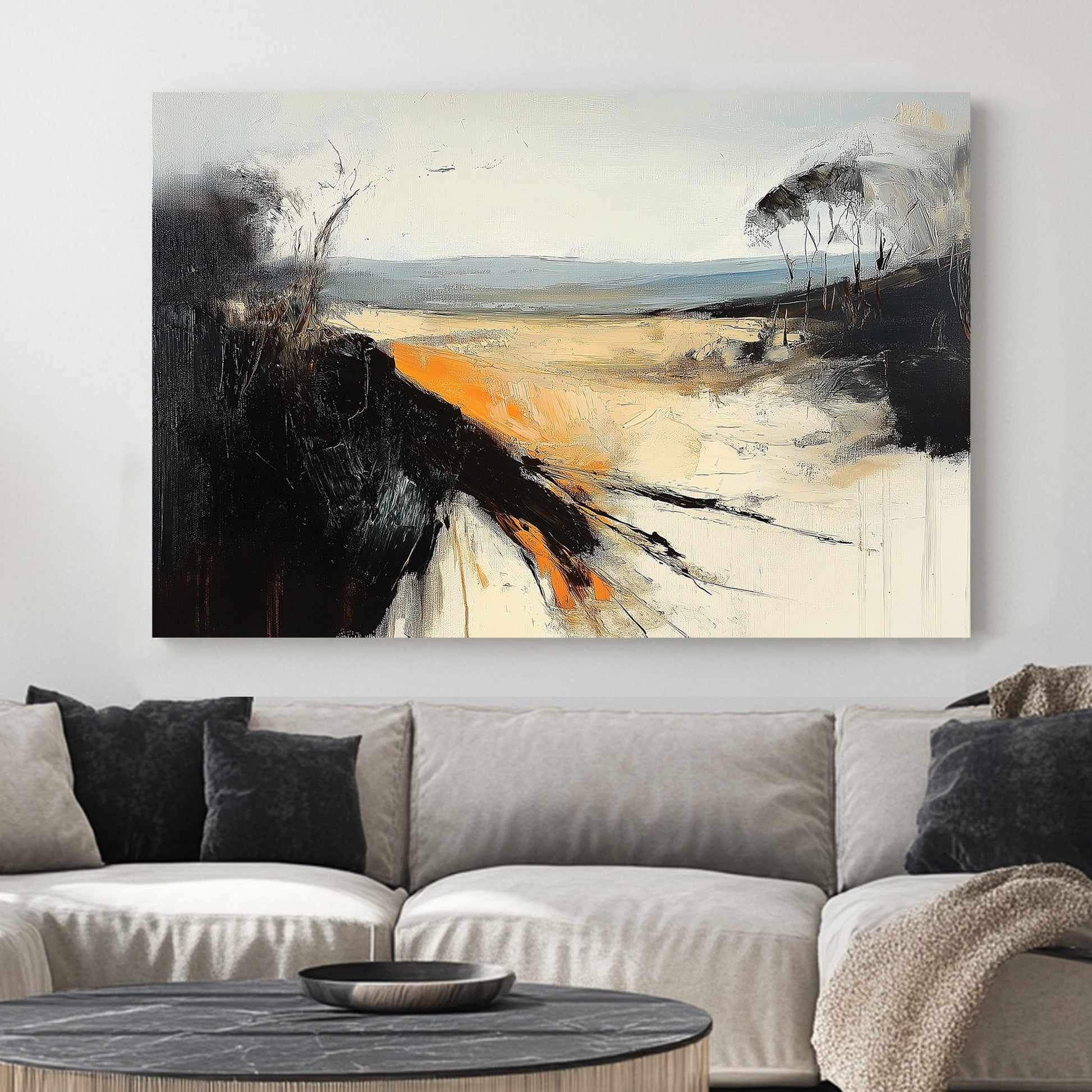 An abstract landscape wall art print with bold black textures, warm orange highlights, and soft beige tones, depicting a windswept horizon with dramatic contrast.