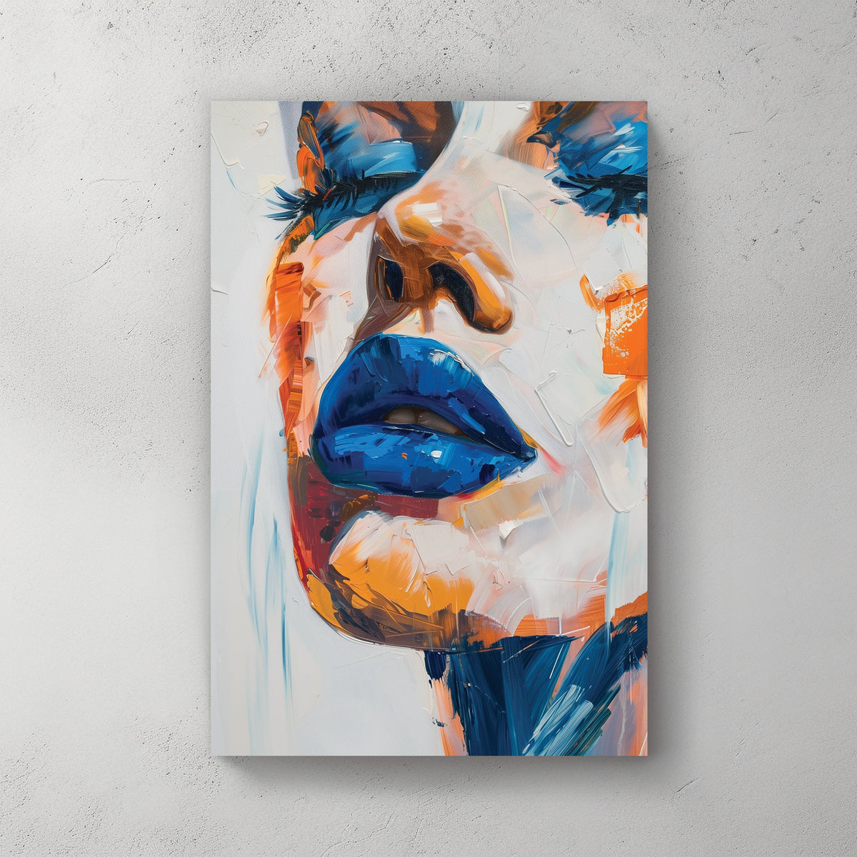 A bold abstract wall art print featuring blue lips with thick, textured paint in orange and peach tones, creating a striking contrast