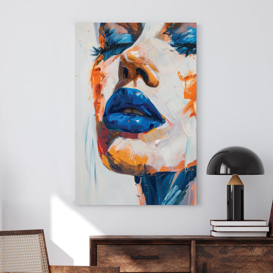 A bold abstract wall art print featuring blue lips with thick, textured paint in orange and peach tones, creating a striking contrast