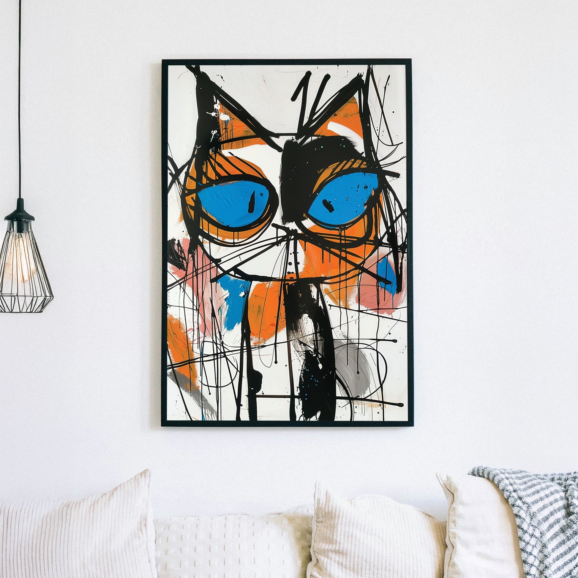 A bold abstract wall art print of a cat with piercing blue eyes, featuring dripping black strokes and vivid orange, pink, and blue accents in a graffiti-inspired style