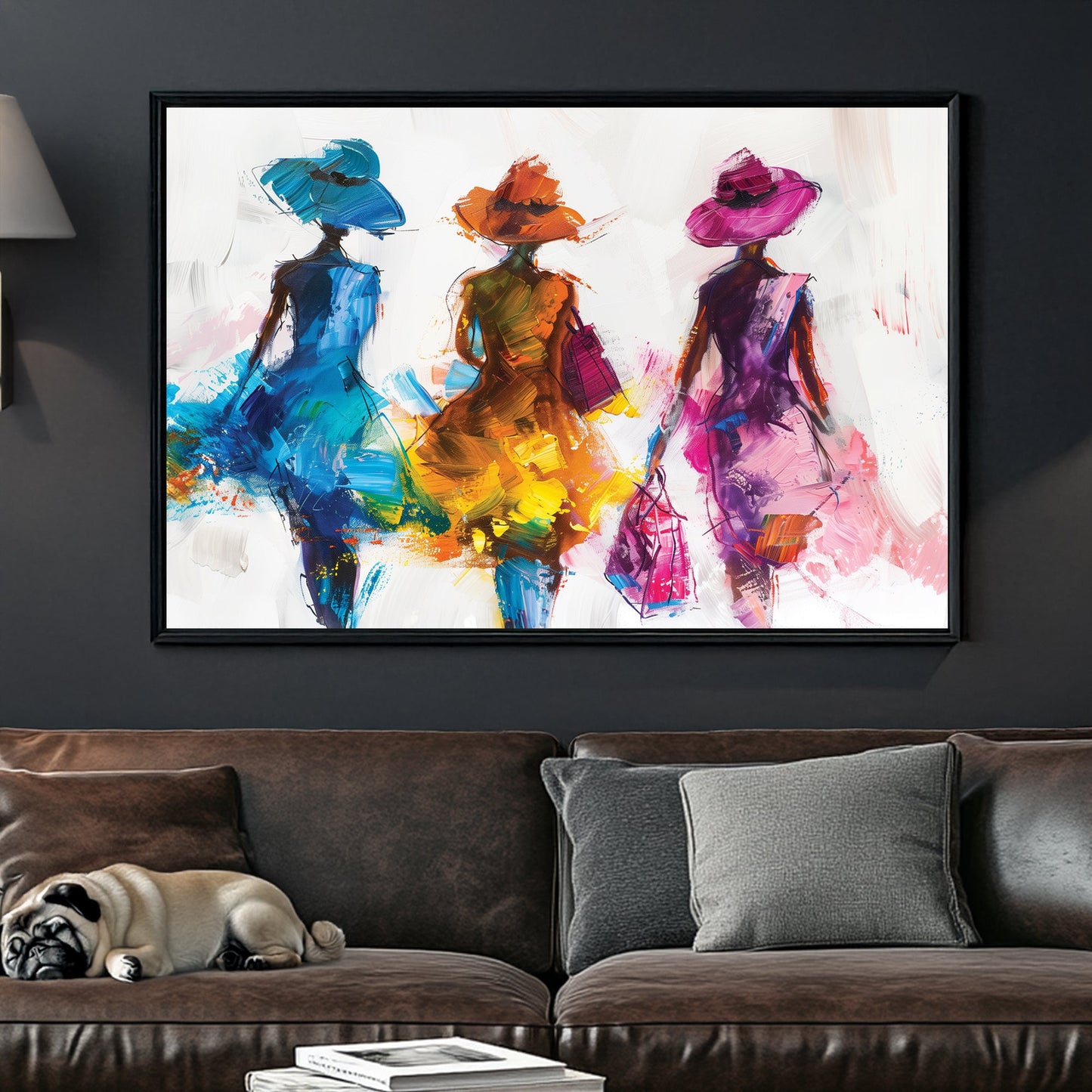 A contemporary wall art print of three stylish women in flowing blue, orange, and pink dresses, depicted with bold brushstrokes and textured layers