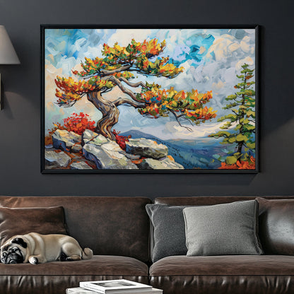 A striking oil wall art print of a twisted mountain tree with vibrant autumn leaves, standing on a rocky cliff against a vast, cloud-filled sky