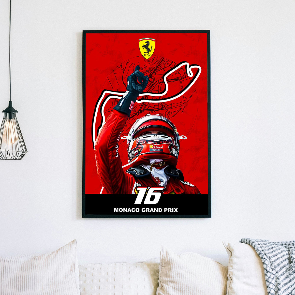 A bold wall art print of a Ferrari driver celebrating victory with a raised hand, set against a red backdrop featuring the Monaco Grand Prix track outline