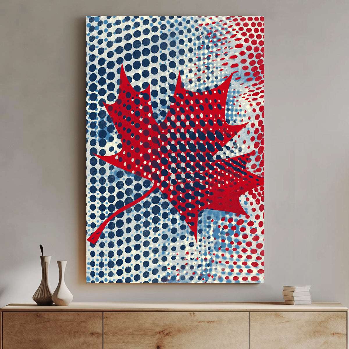 Pop art-style maple leaf artwork with bold red, blue, and white halftone dots in a modern Canadian design.