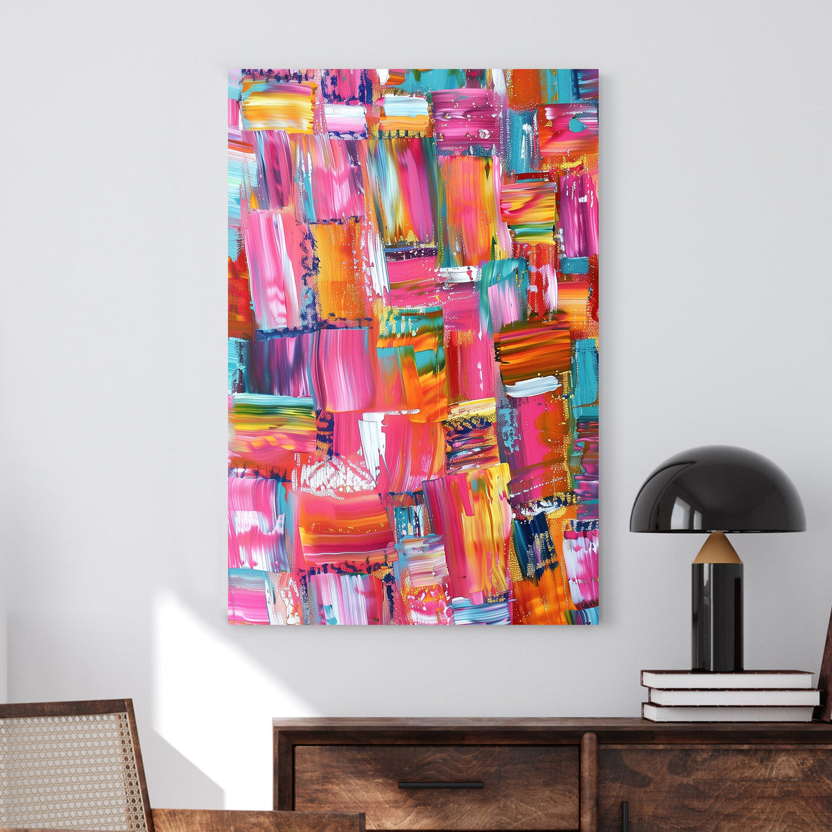 Abstract wall art with bold brushstrokes in pink, teal, orange, and gold, creating a vibrant and textured composition.