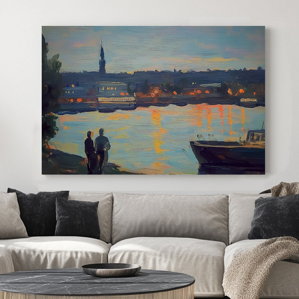 Impressionist wall art of a riverside cityscape at twilight, with warm lights reflecting on the water.