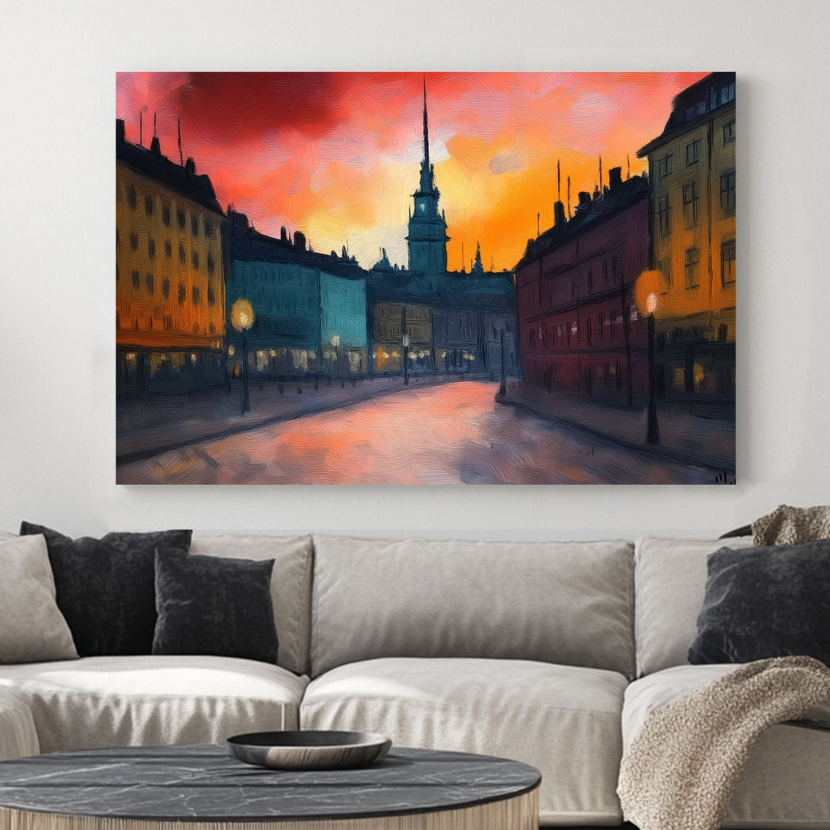 Impressionist wall art of a European city at sunset with glowing streetlights and a warm, textured sky.