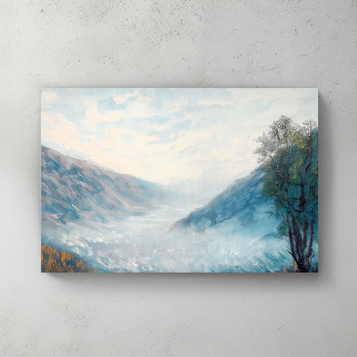 Impressionist wall art of a misty mountain valley with soft blue hues, rolling fog, and a lone autumn tree.