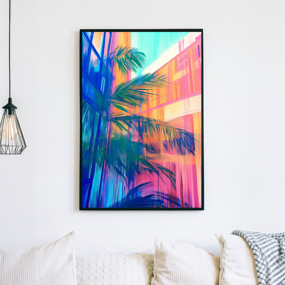 Abstract neon wall art of palm leaves reflecting against colourful city buildings and glass windows.