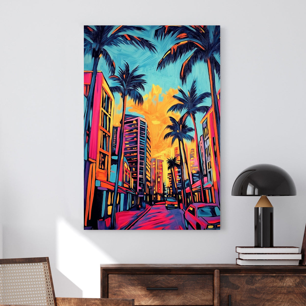 Vivid neon cityscape wall art of palm trees, glowing skyscrapers, and a sunset sky with warm, saturated hues.